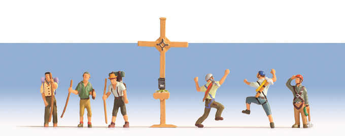 N Bergwanderer mit Gipfelkreuz
