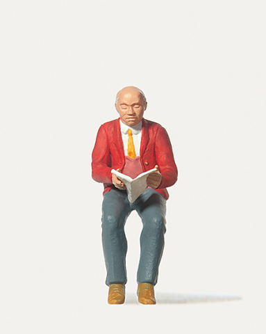 Sitzender Zeitungsleser