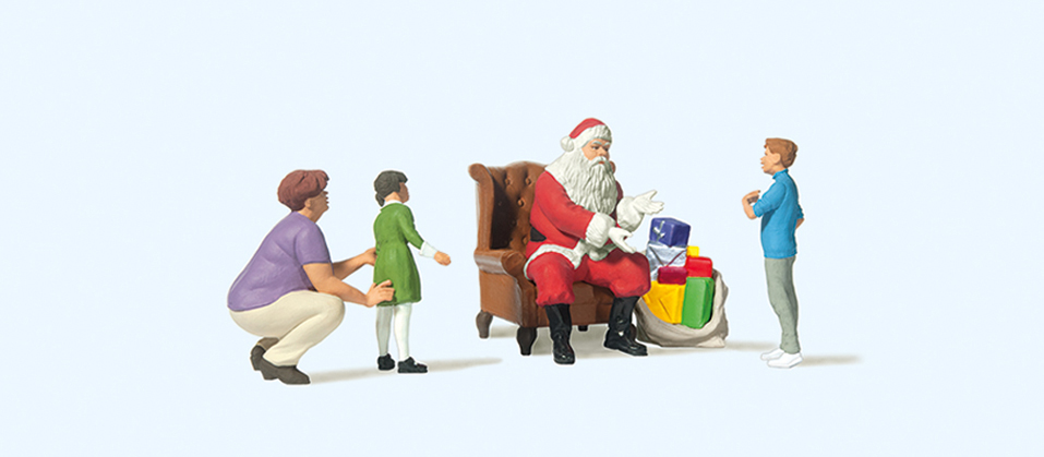 1:87  Weihnachtsmann im Sessel. Mutter mit Kinder